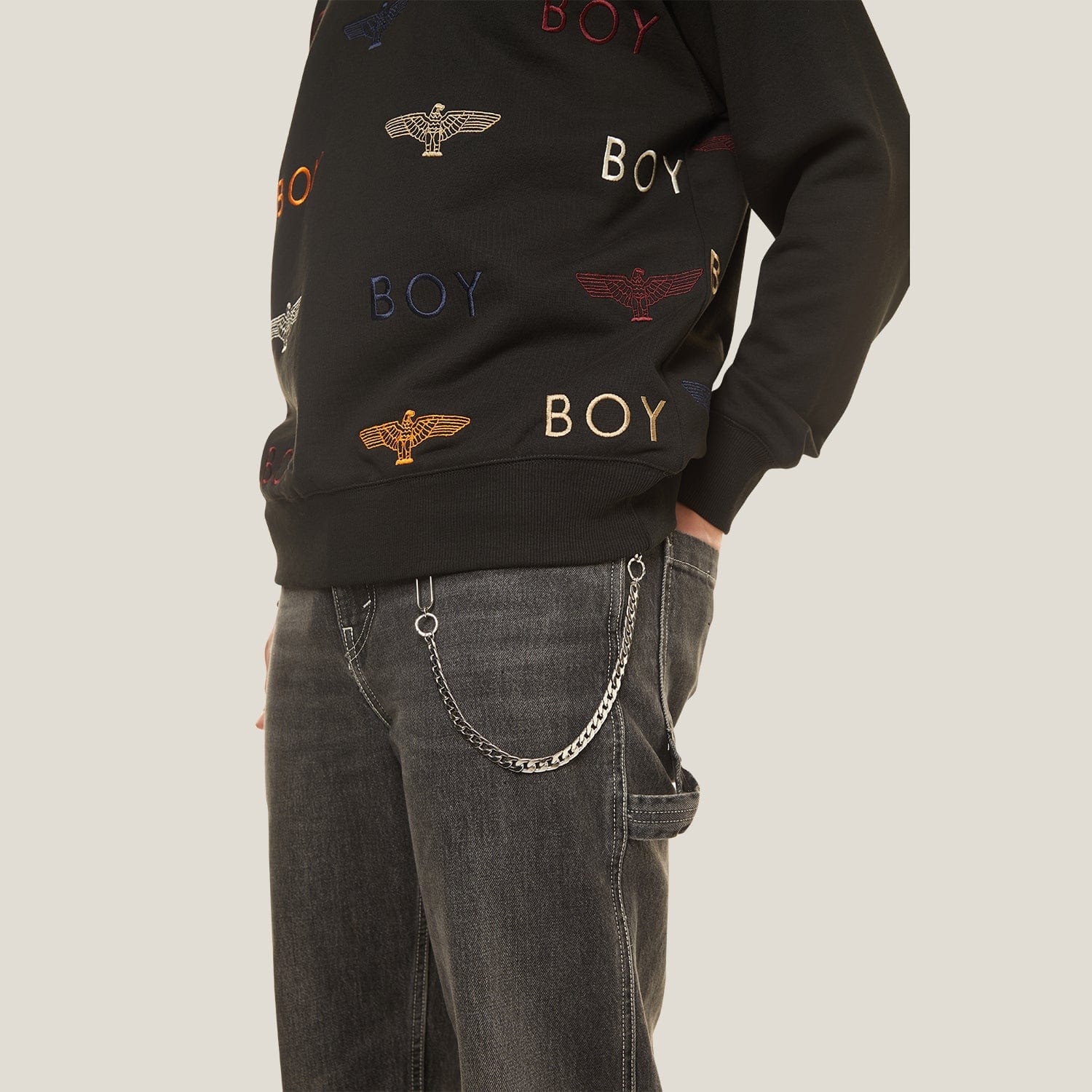 Black Boy London sweatshirt with 'BOY' logo and eagle design on a white background