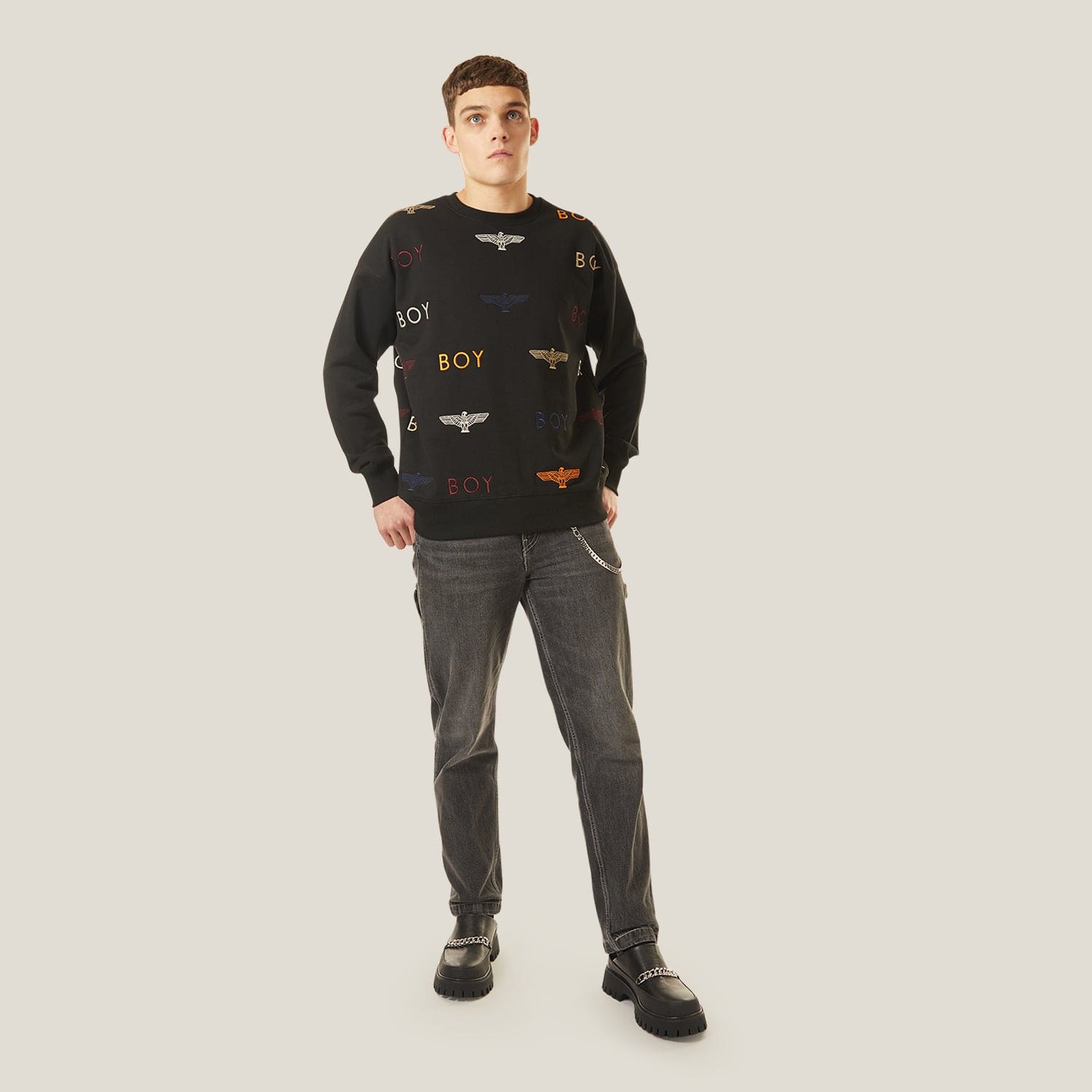 Black Boy London sweatshirt with 'BOY' logo and eagle design on a white background