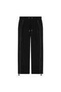 Black BOY London pants on a white background