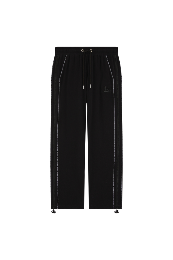 Black BOY London pants on a white background