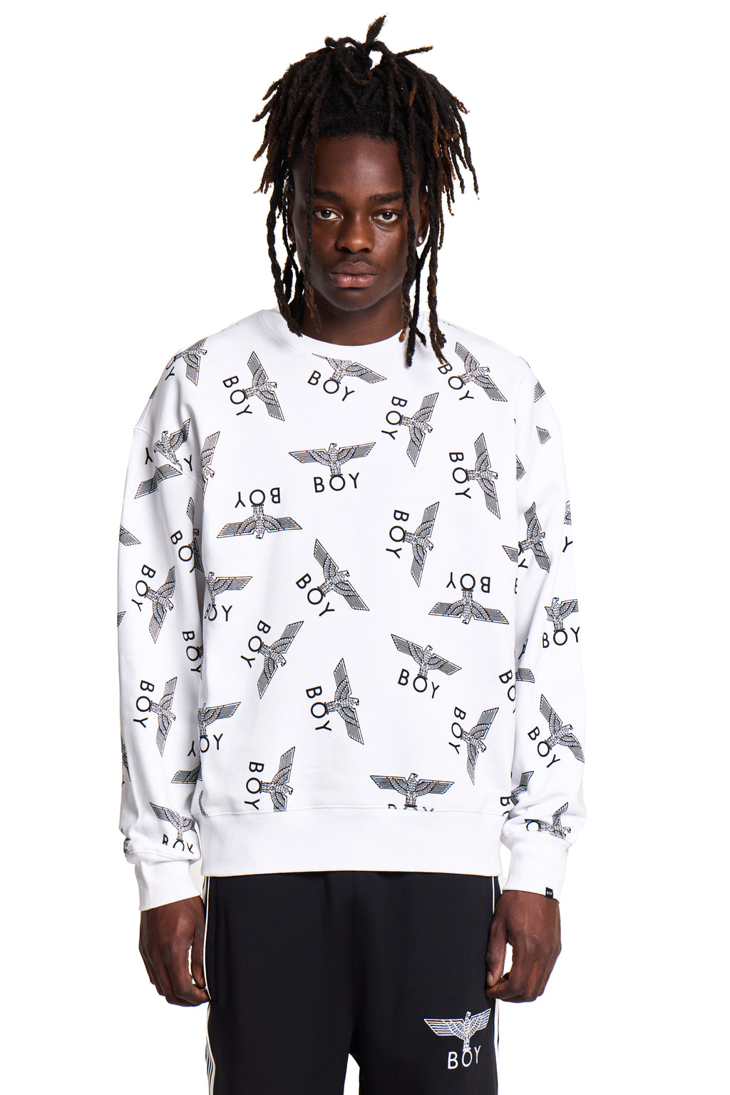 Person wearing a white Boy London sweatshirt with black and gray patterns on a white background