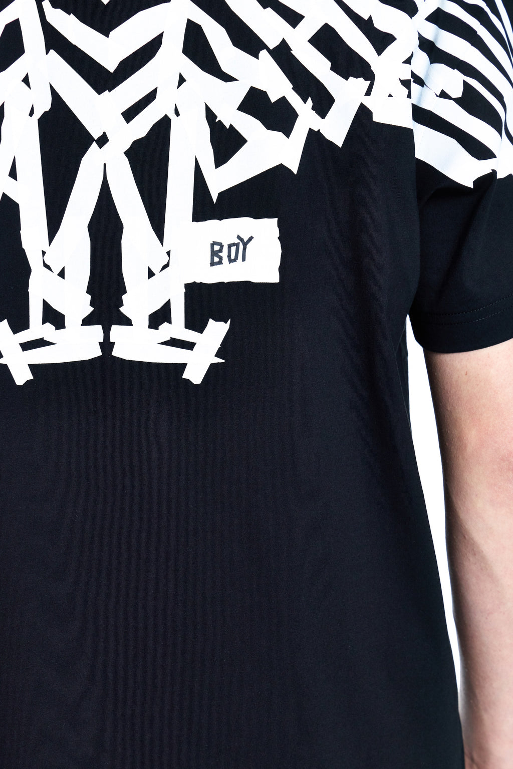 Black t-shirt with white abstract design and 'BOY' text on a white background