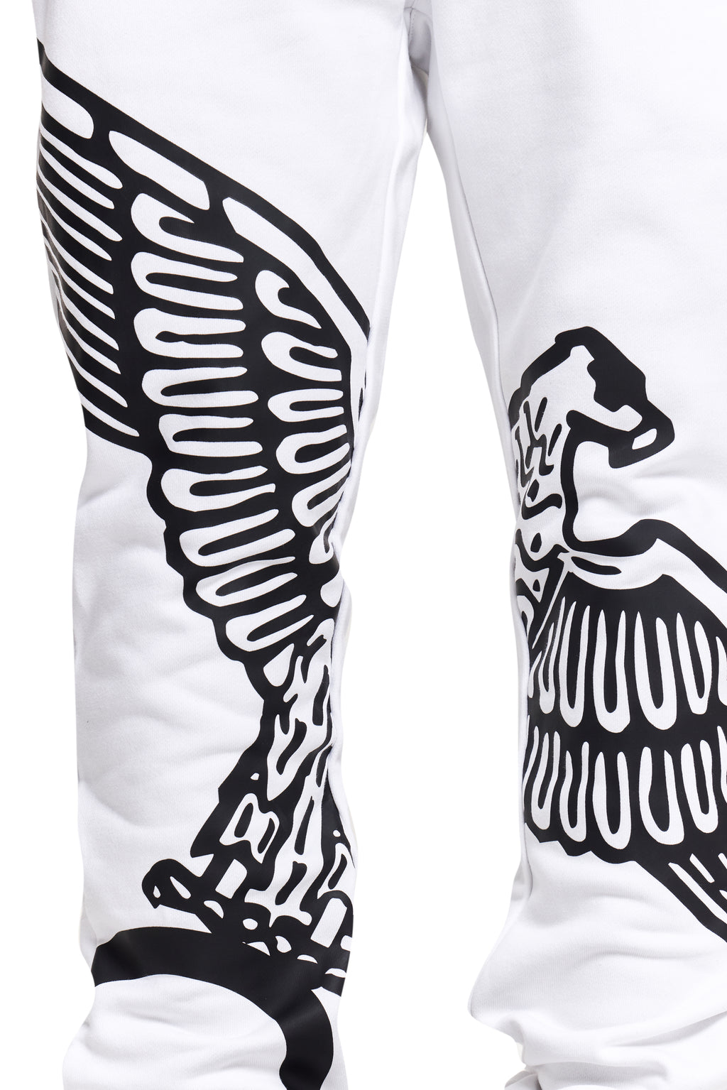 White BOY London pants with black wing-like designs on a white background