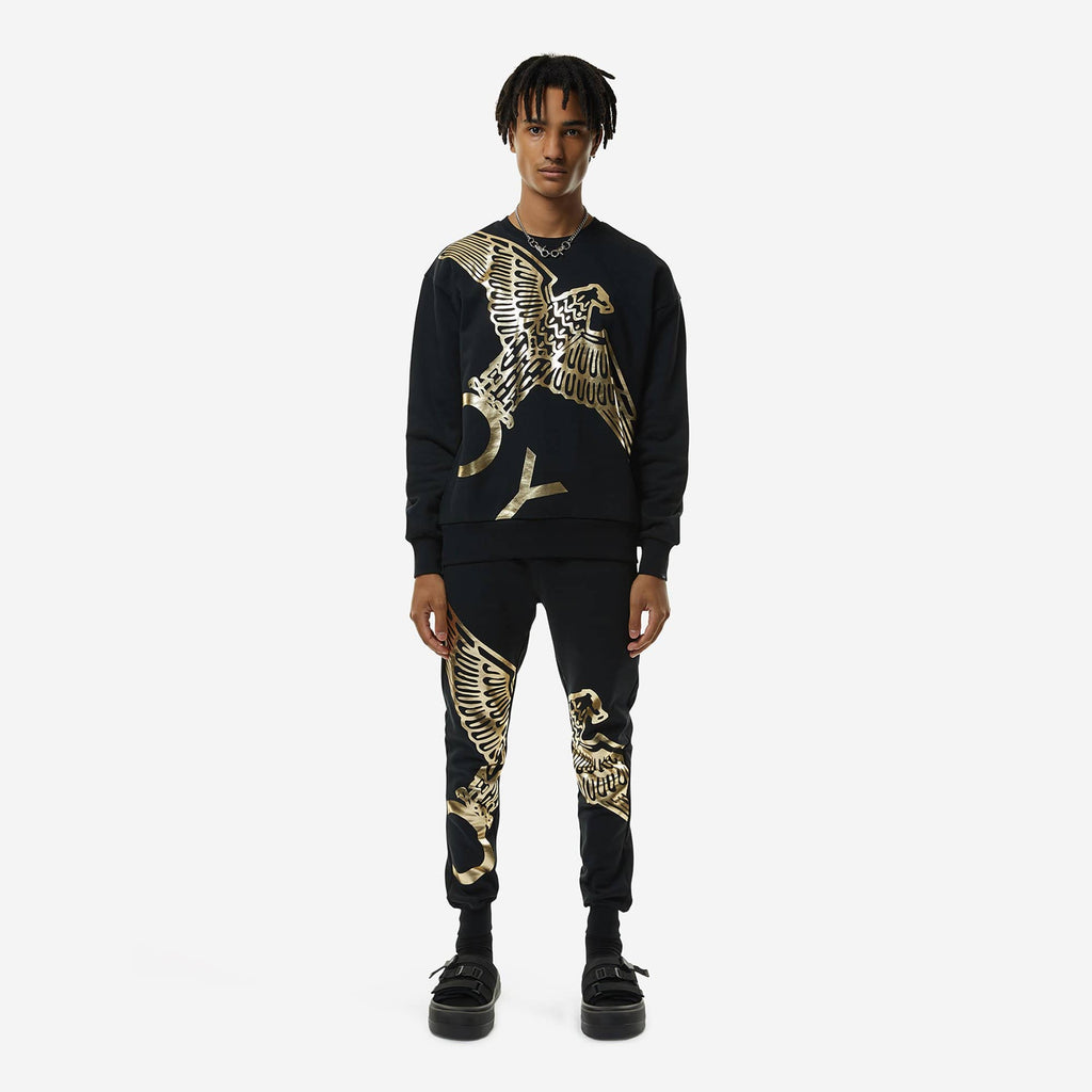 Black Boy London sweatshirt with gold eagle design and 'BOY' branding on a white background