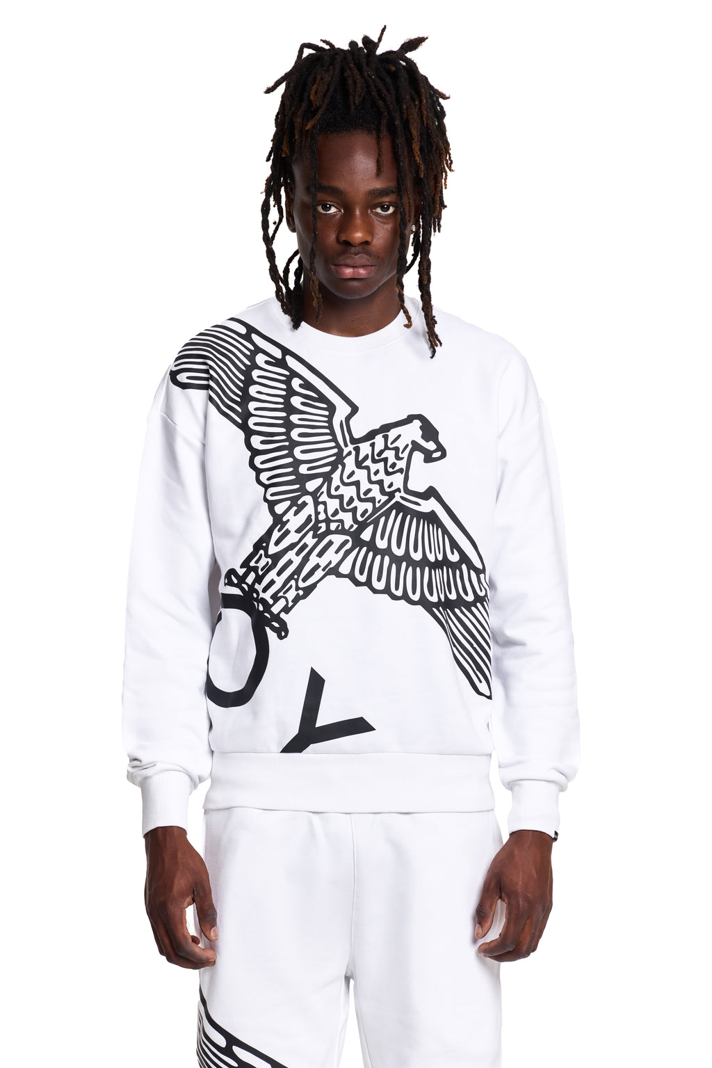 Model wearing a white BOY London sweatshirt with an eagle design on a white background