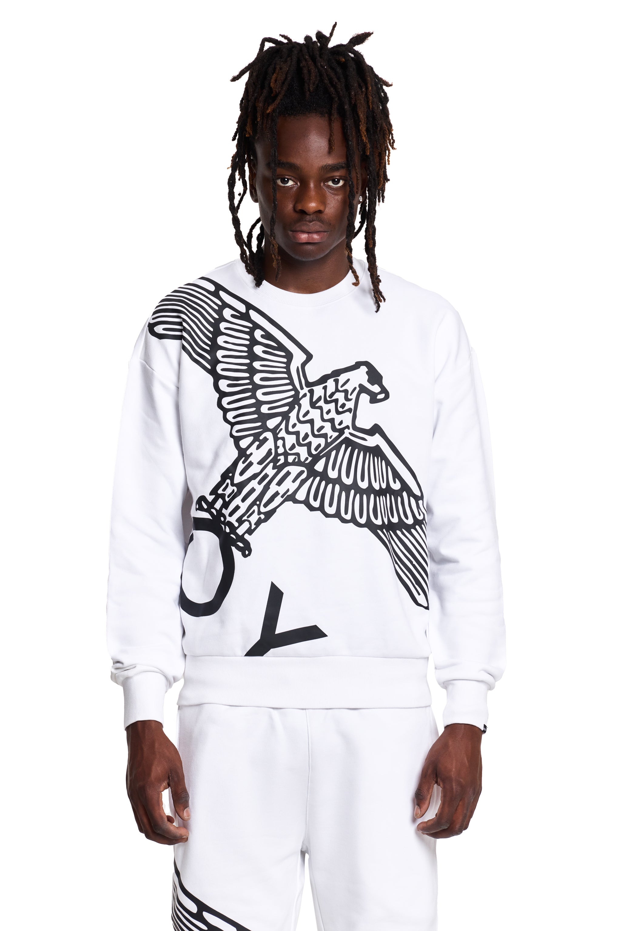 Model wearing a white BOY London sweatshirt with an eagle design on a white background