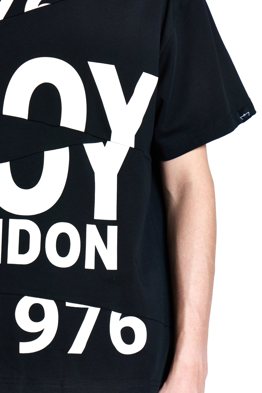 Black t-shirt with white text 'BOY LONDON 976' on a white background