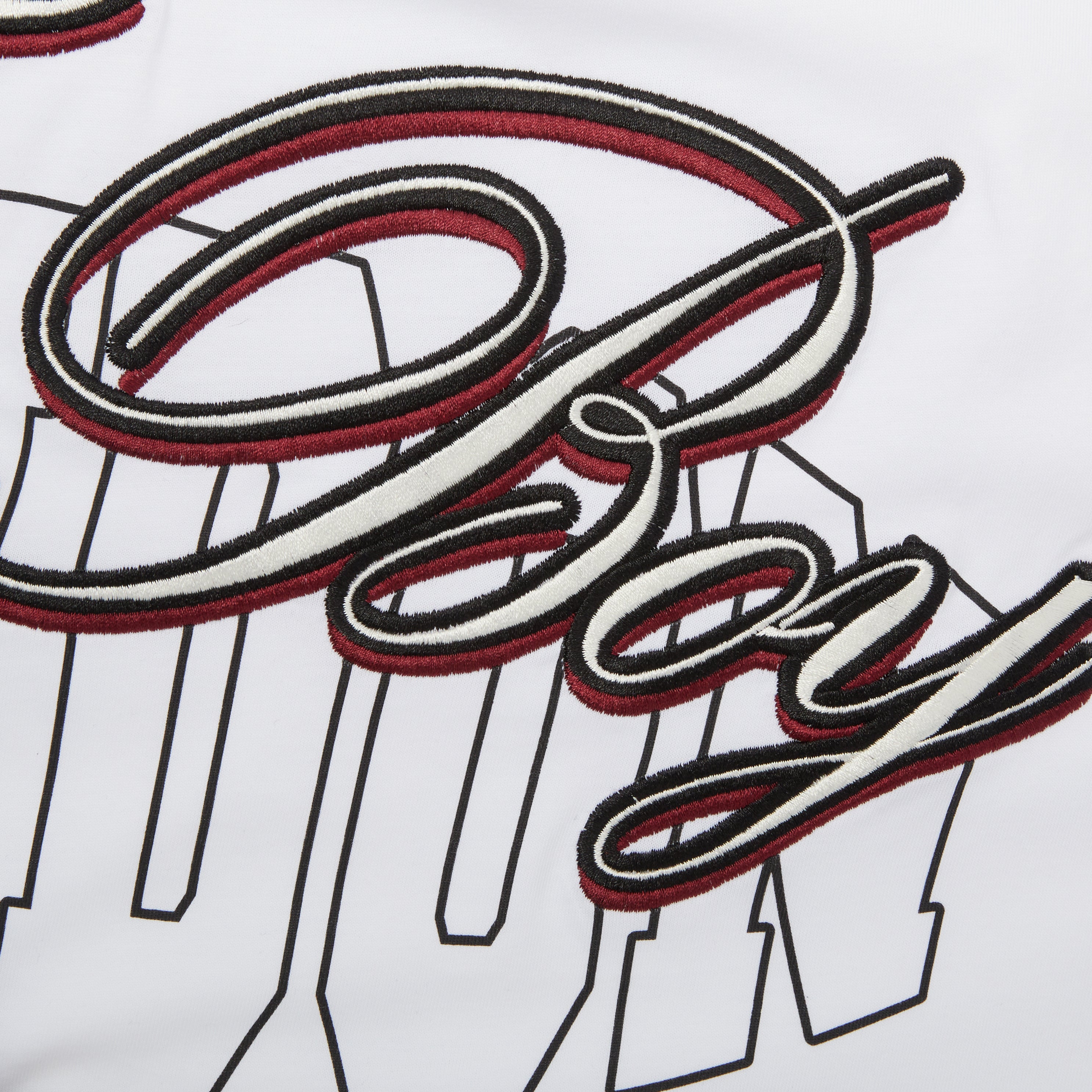 White Boy London crew neck t-shirt with a large logo print on the front and back featuring the text 'The Boy' and the year '1976' with a star and wings motif.