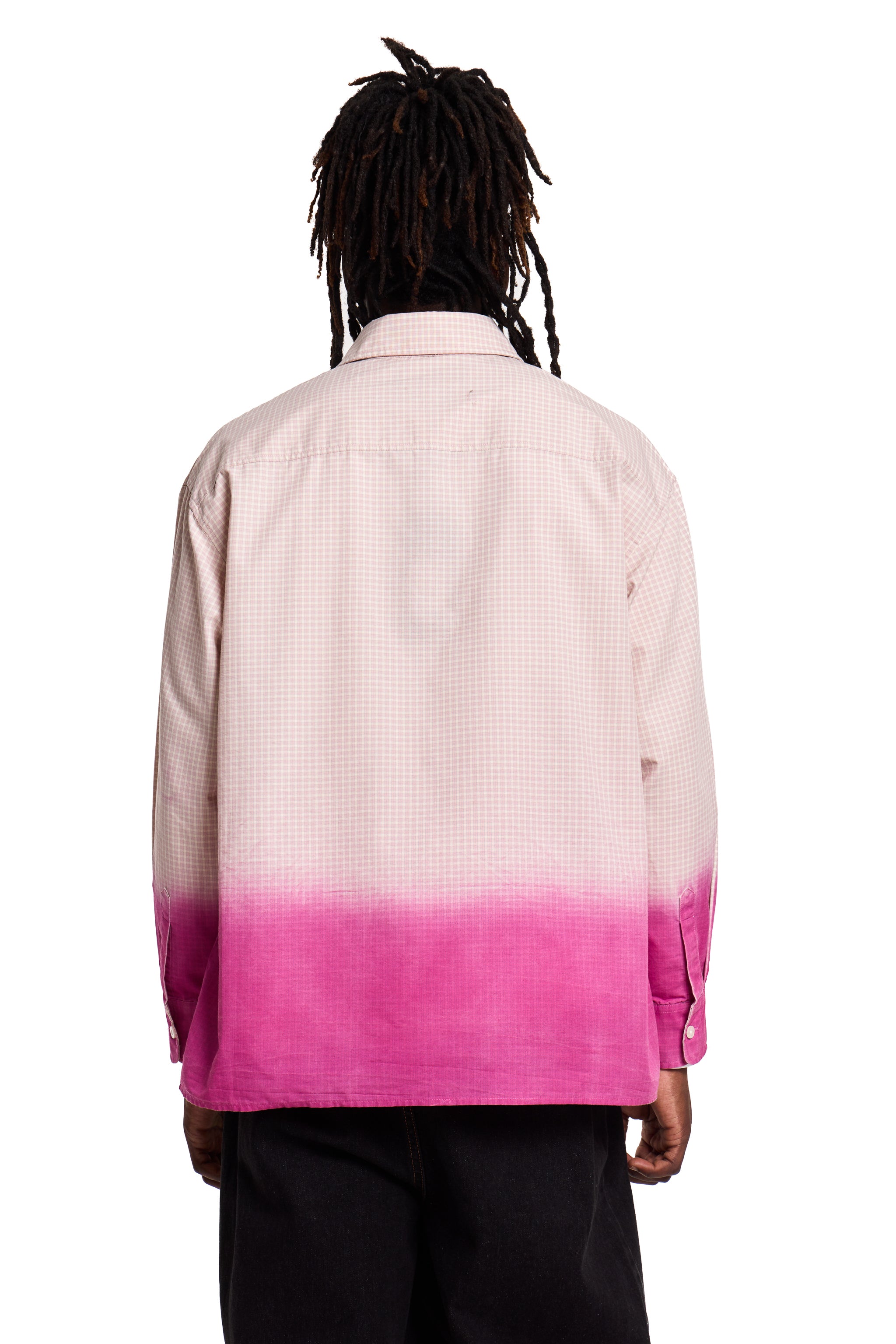 Person wearing a pink and white Boy London checkered shirt with a gradient to magenta at the bottom on a white background