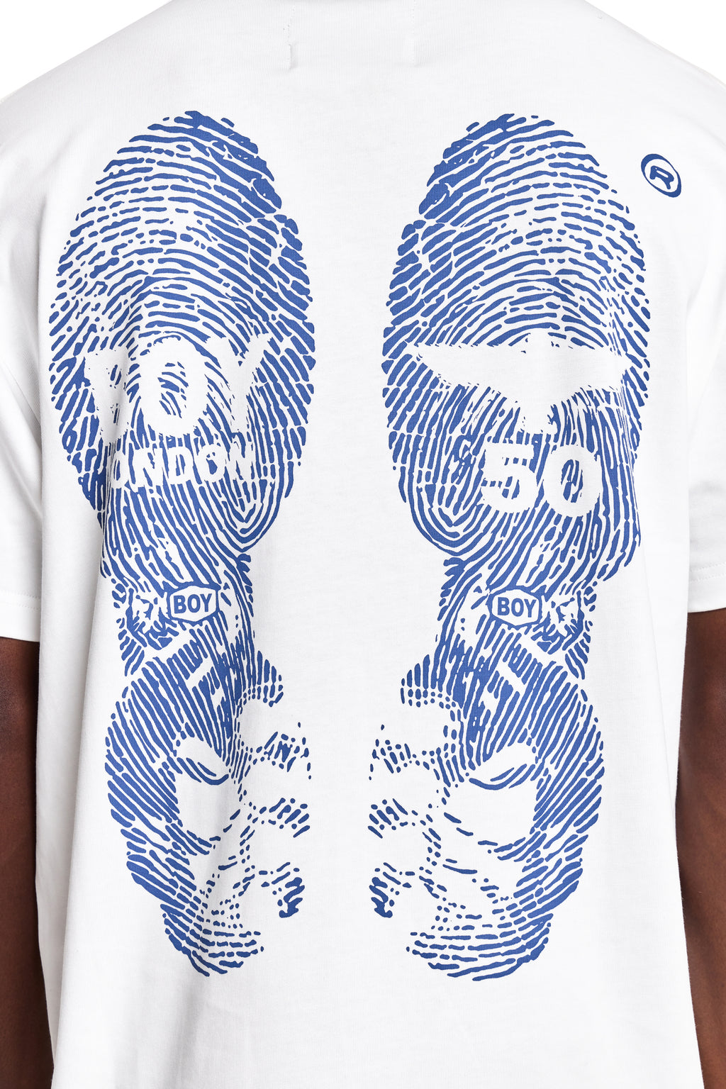White t-shirt with blue graphic design of sandals on a person wearing it.