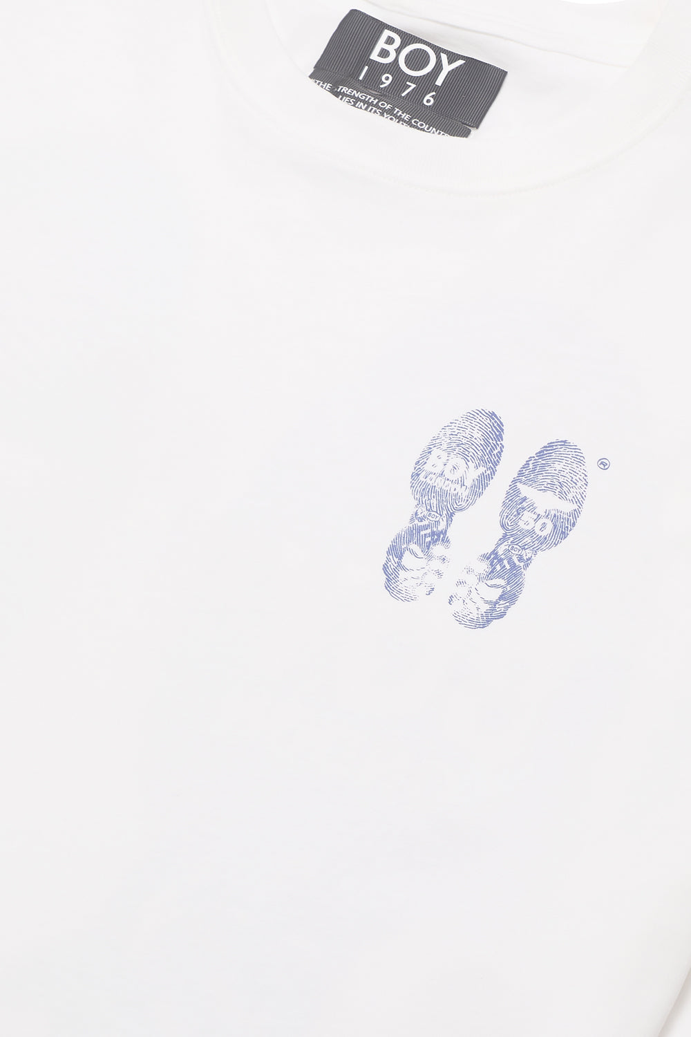 White BOY London underwear with blue sequin design and 'BOY 1976' label on a white background