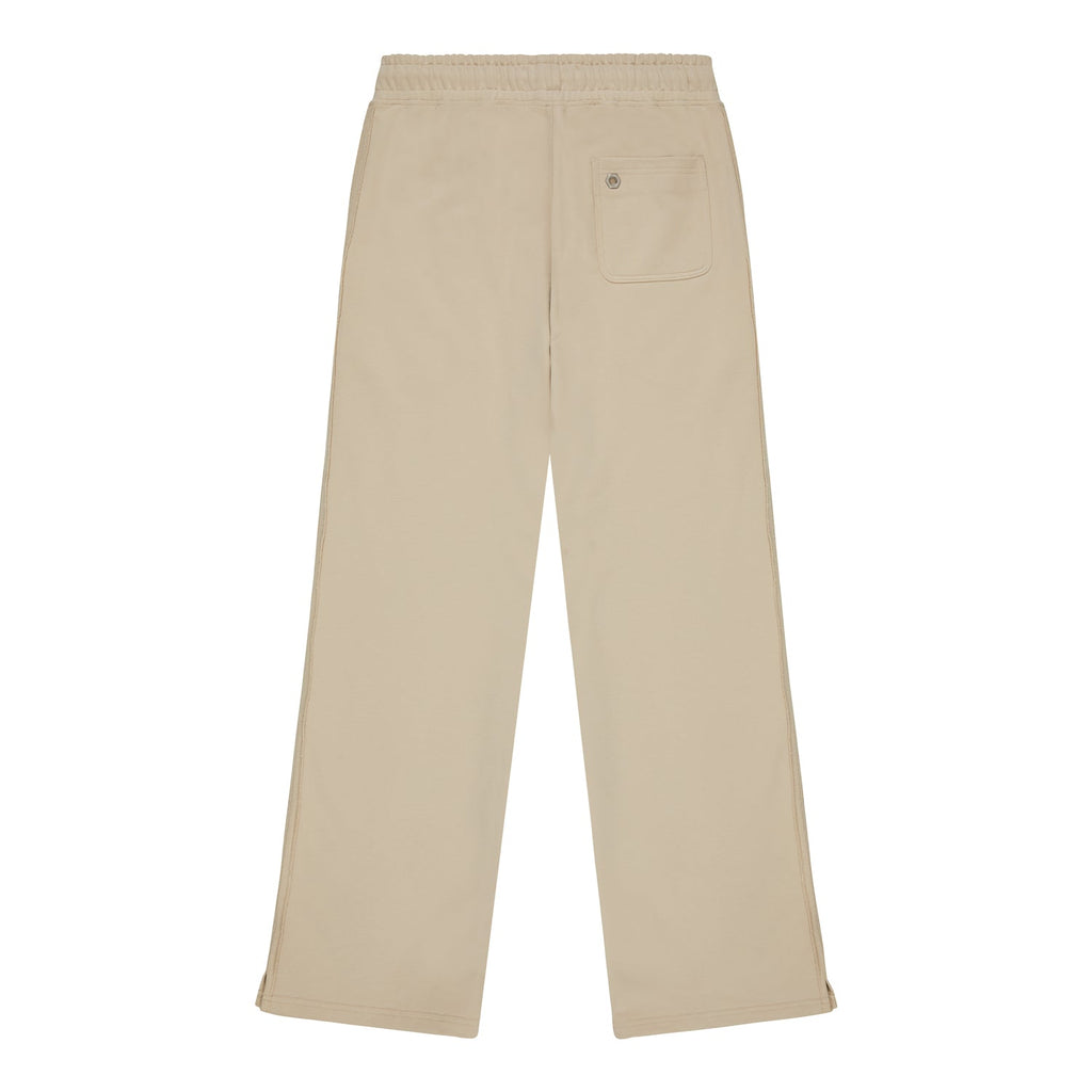 Beige pants with a BOY London logo on a white background