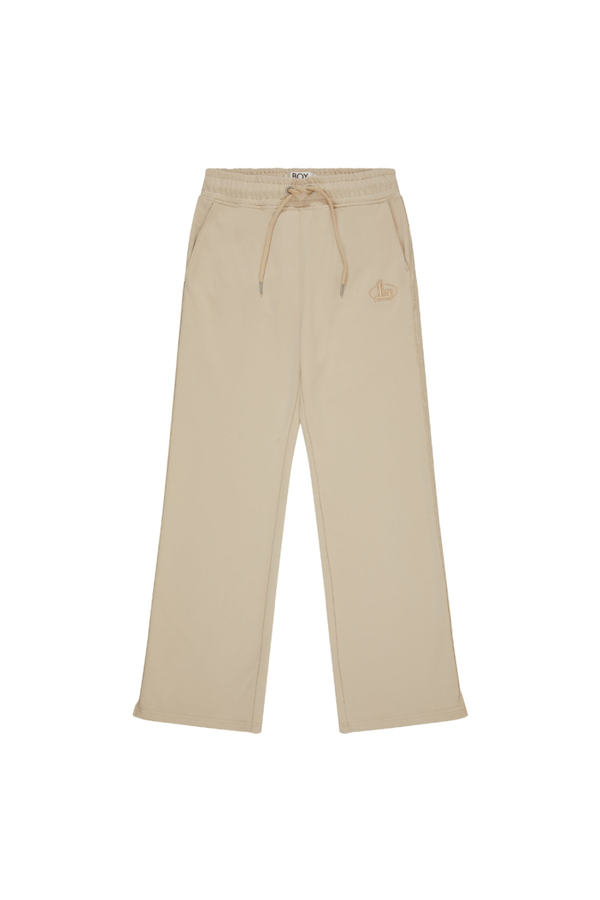 Beige pants with a BOY London logo on a white background