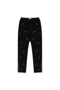 BOY London trousers on white background