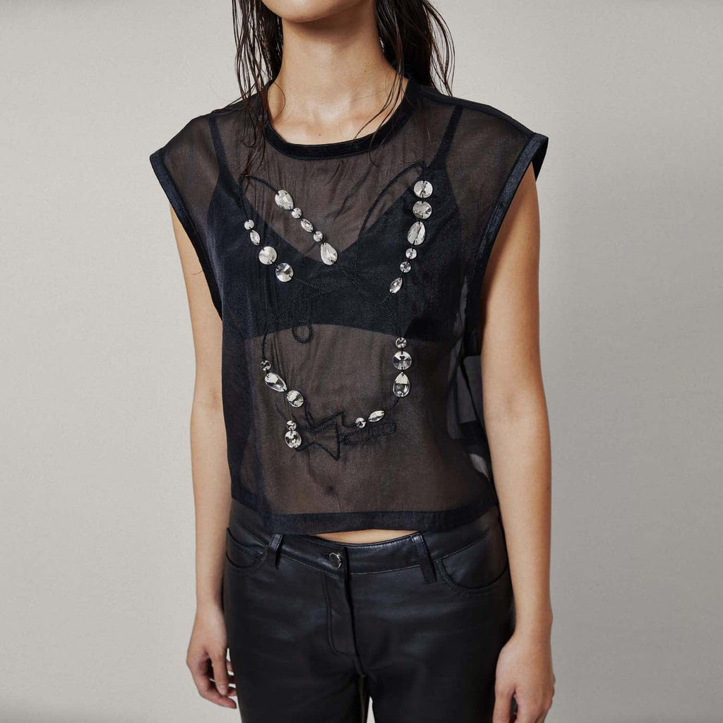 Model wearing BOY London top on white background