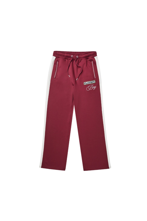 BOY London red trousers on white background