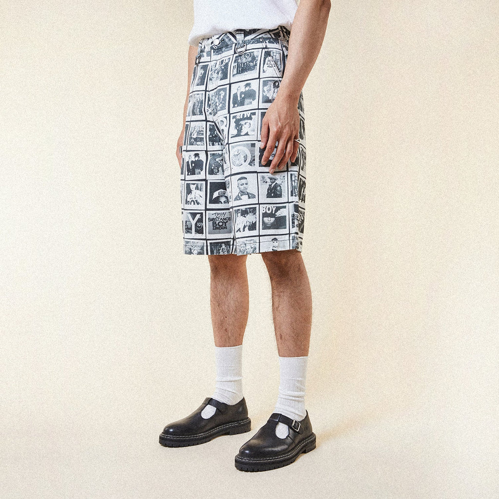 Model wearing BOY London Pants with a black and white photo collage pattern on a white background