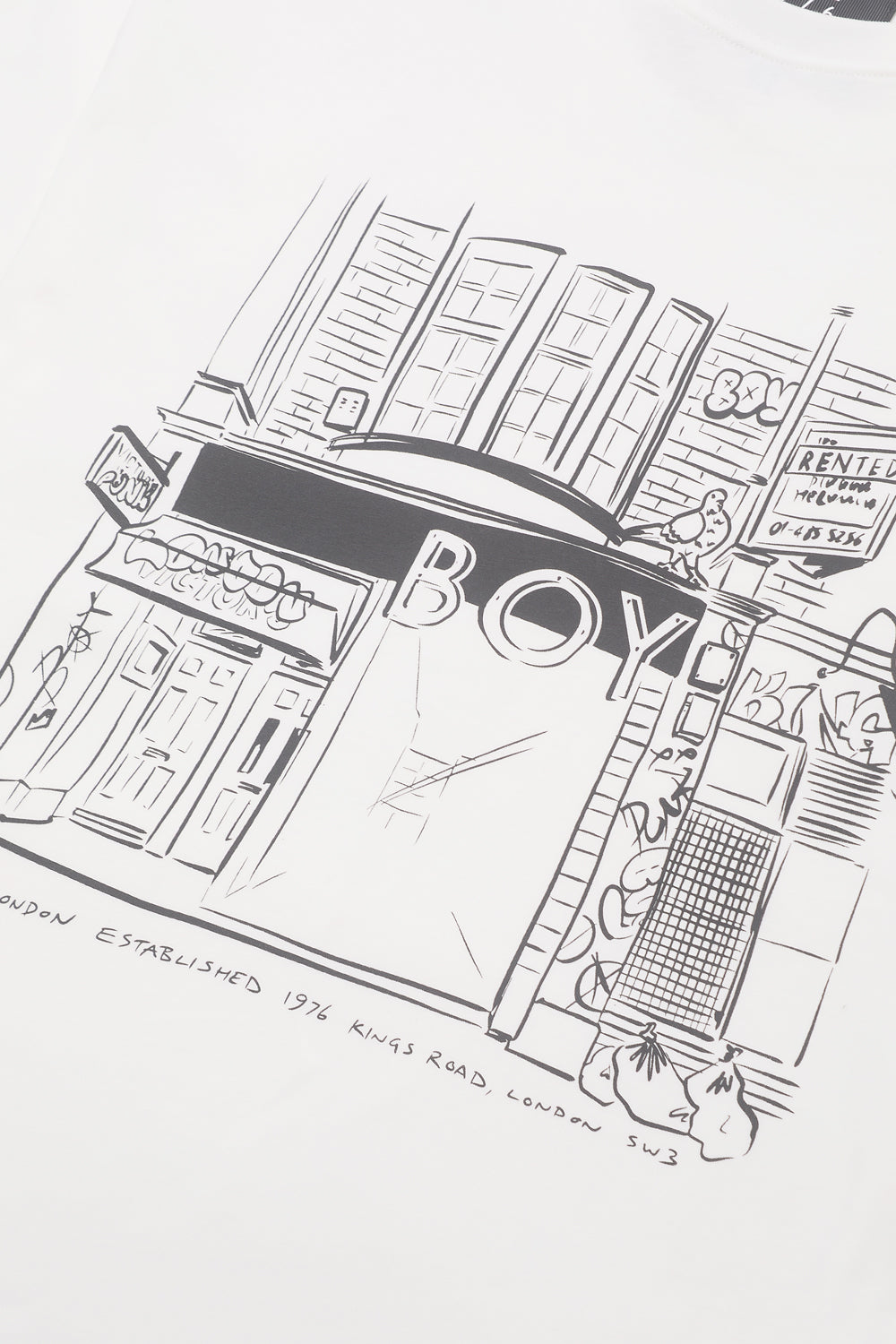 Black and white T-Shirt illustration of a city street scene with buildings and text.