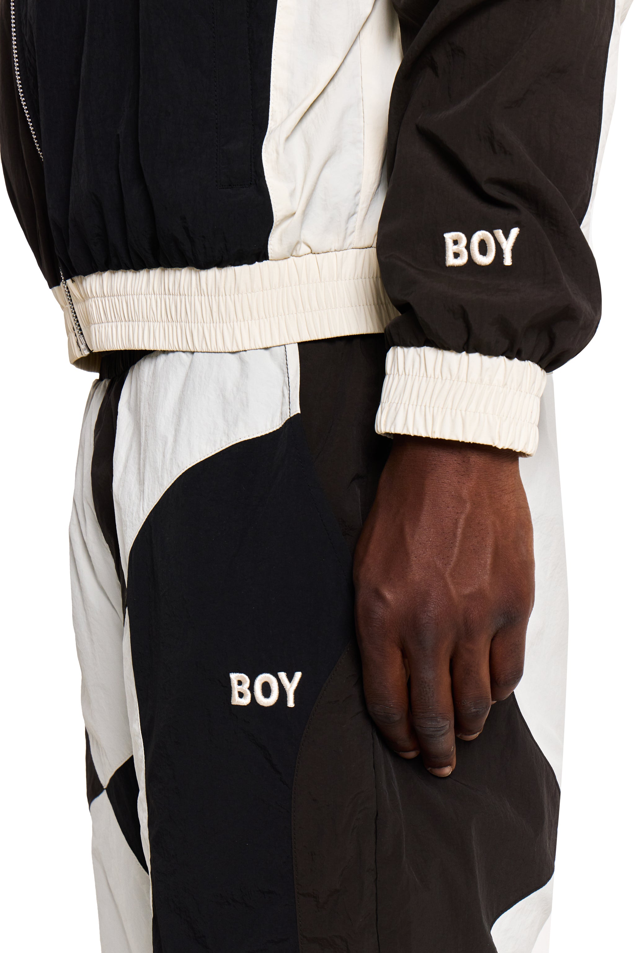 Black and white Boy London jacket with 'BOY' branding on a white background