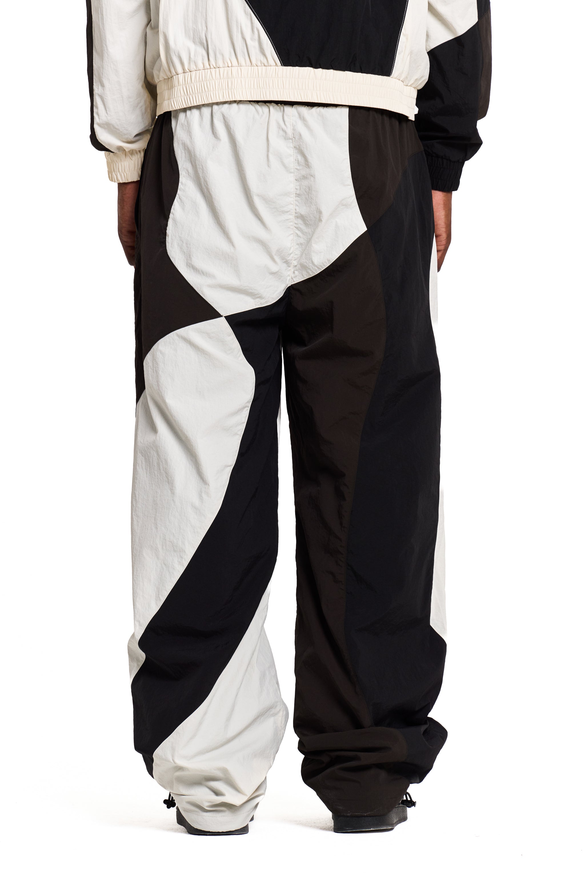 Black and white striped pants on a white background