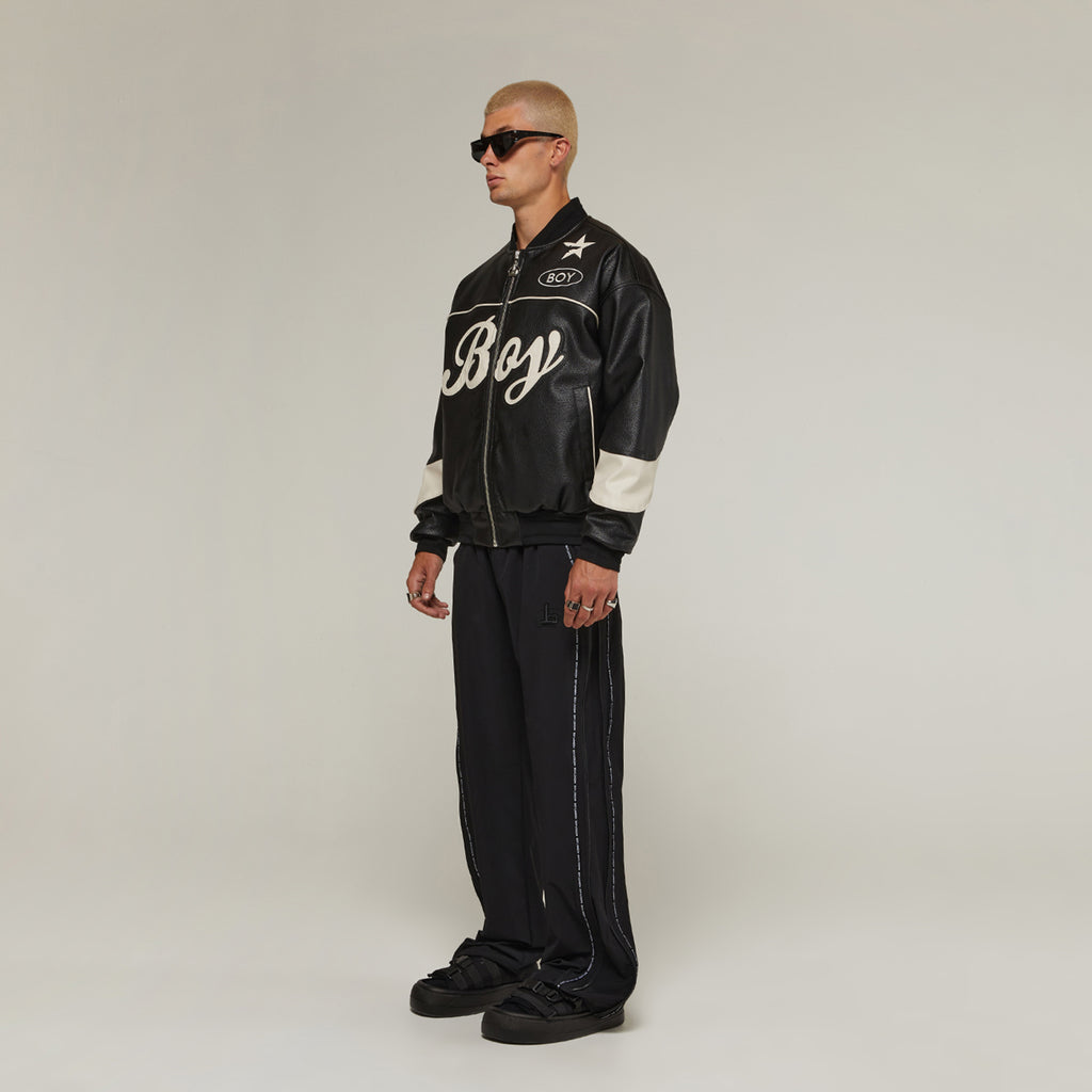 Male model wearing Boy London on white background