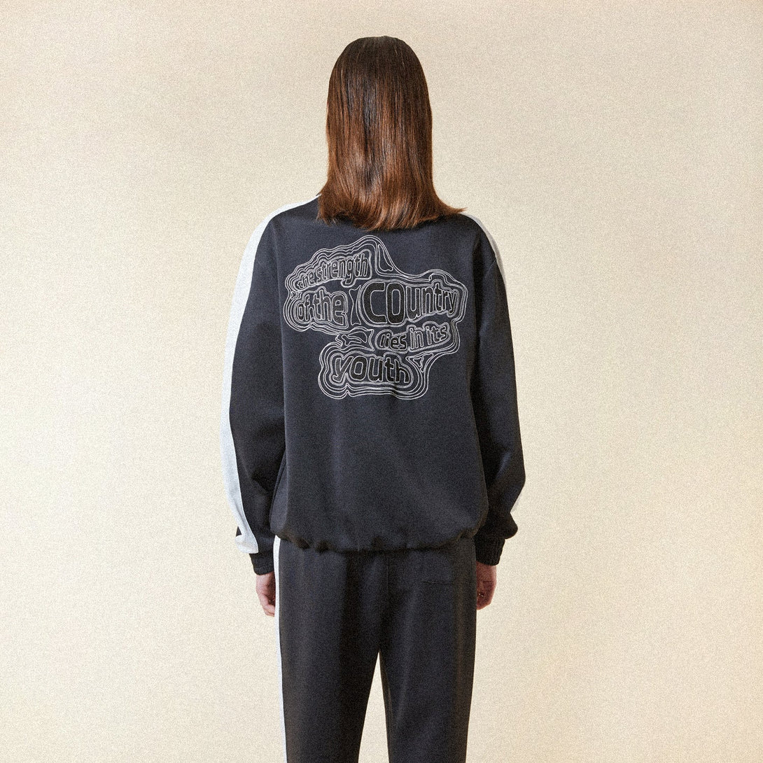 STRENGTH TRACK TOP - BLACK/WHITE